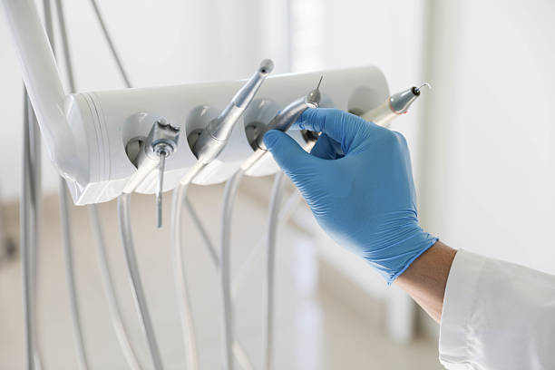 Professional Root Canal Treatment technician working in Briscoe County County, TX